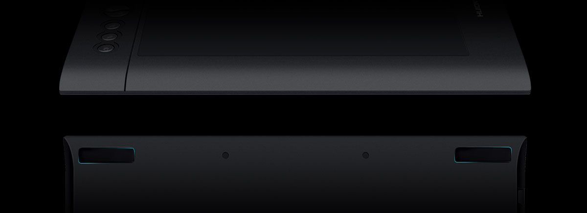 Upper part of the picture is bottom of the drawing tablet. Lower part is the rear of the drawing tablet, highlighting the anti-slip rubber pads.